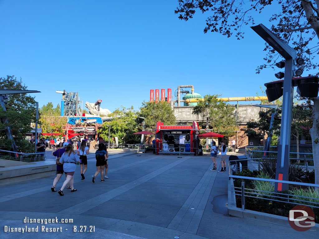 A merchandise cart and beyond it the restrooms.  This area used to be Flik