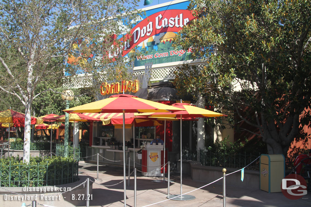 Corn Dog Castle has a single register on the side now, mobile pickup is the center space.