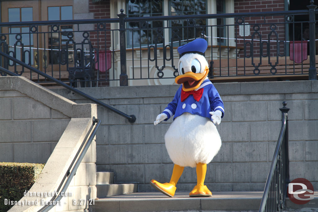 Donald out with several others visiting with guests from the Main Street Train Station