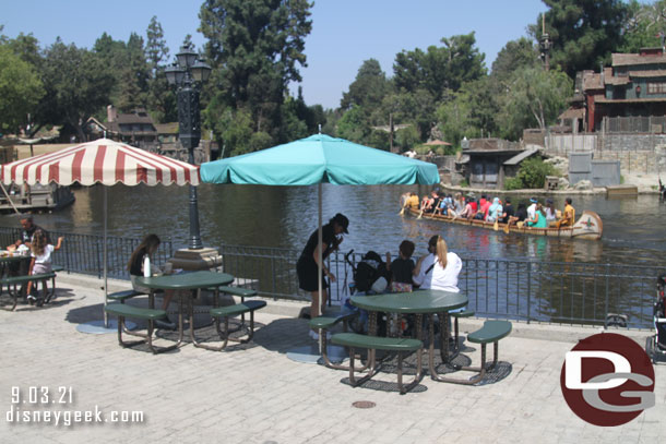 At this hour of the day, umbrellas do not offer a lot of shade at the tables, it was just past noon.