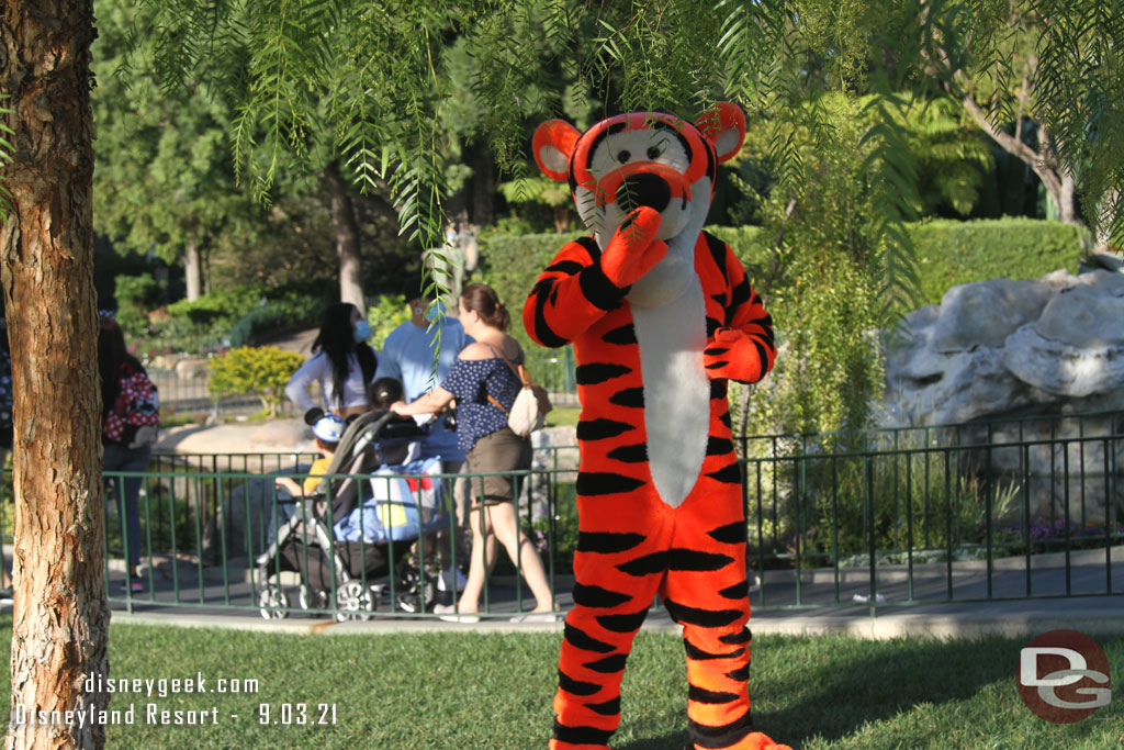 Tigger meeting guests.