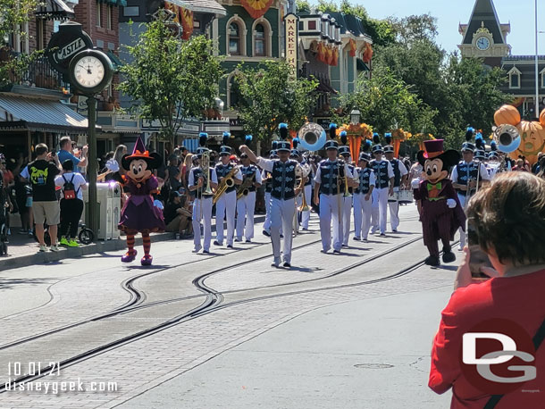 11:45am - The Disneyland Band, Mickey Mouse and Minnie Mouse marching along Main Street USA.