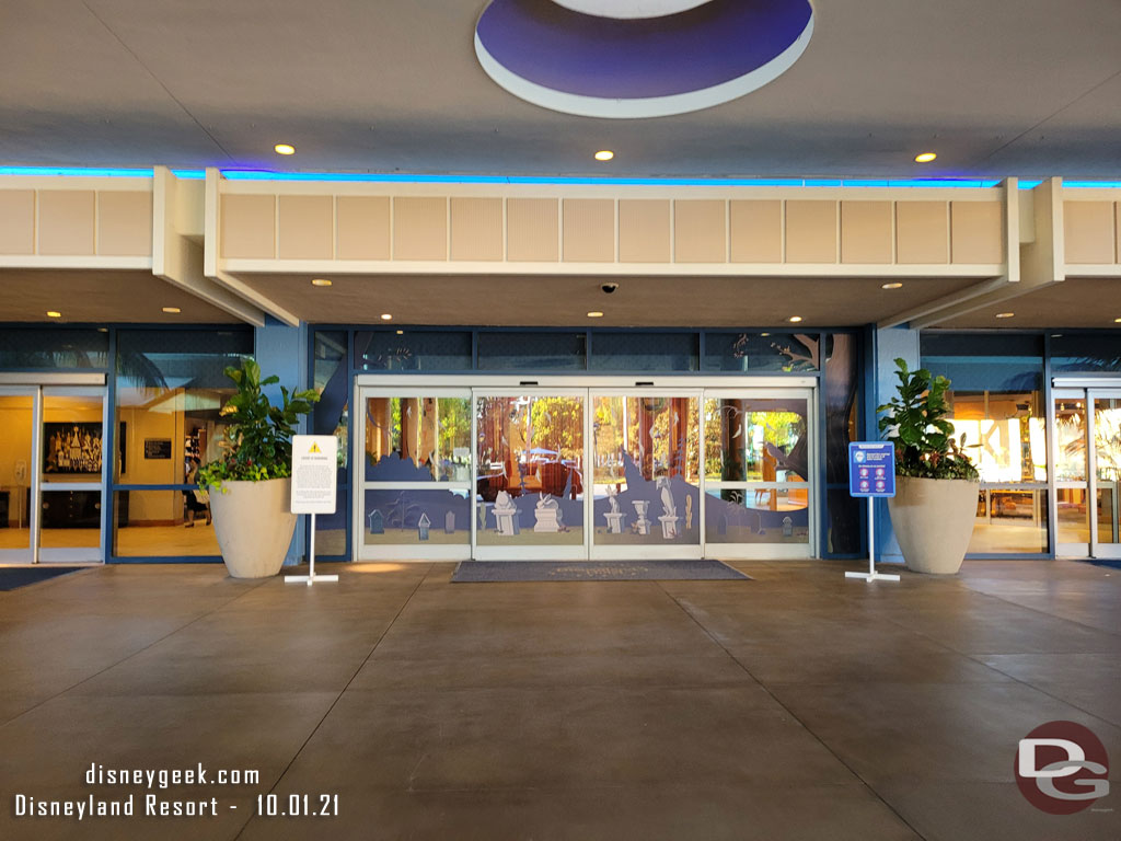 The front entrance to the Disneyland Hotel lobby.  For Halloween this year the lobby features some Haunted Mansion photo opportunities.