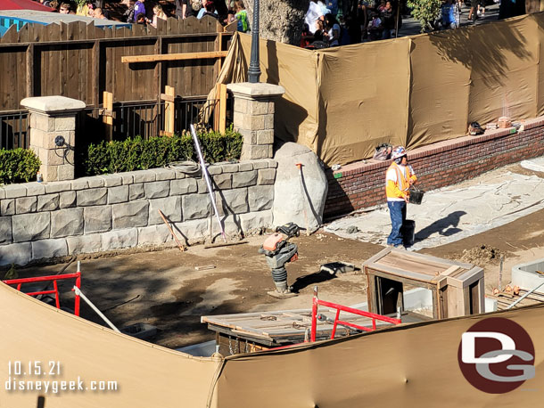 This area looks to be leveled and compacting is going on in preparation for the new walkway to be installed.