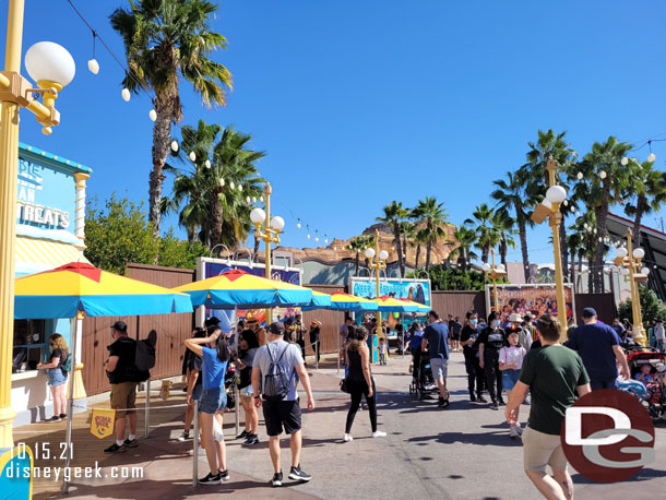 The line for frozen treats stretched to past the Coco billboard.