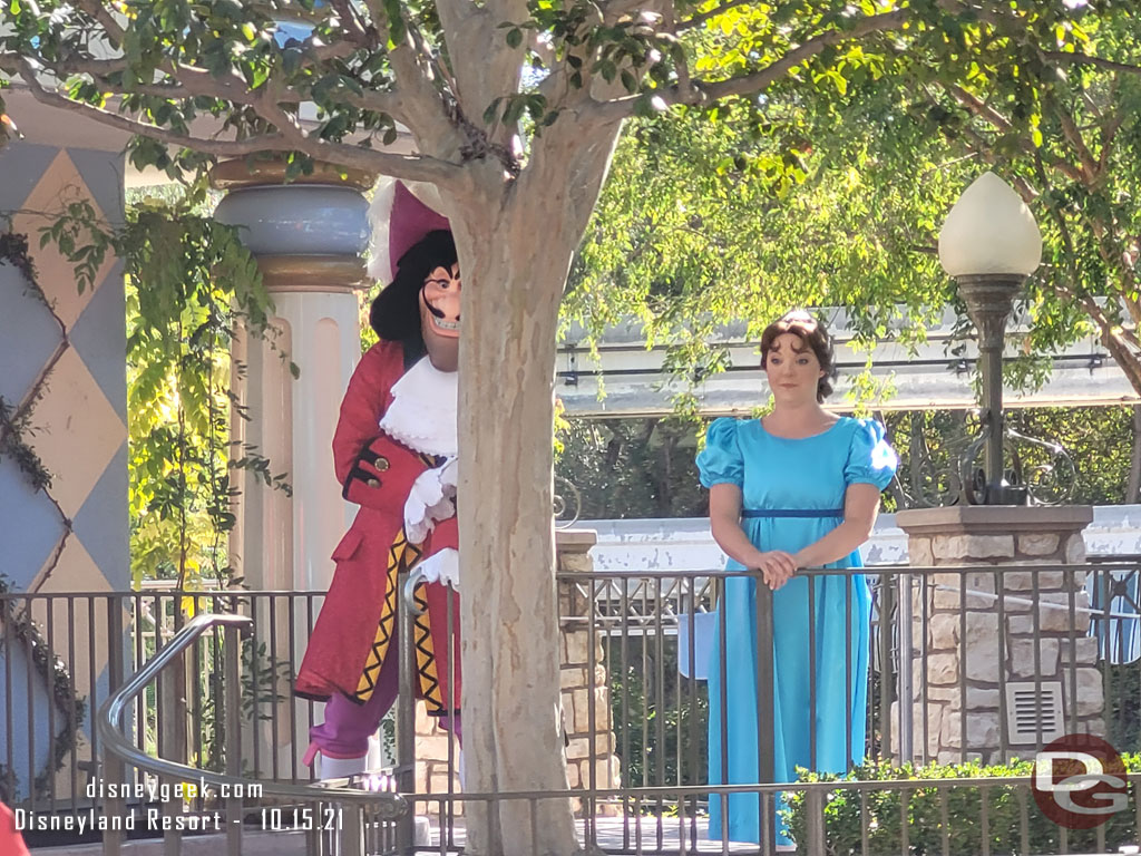 Captain Hook trying to hide near Wendy.