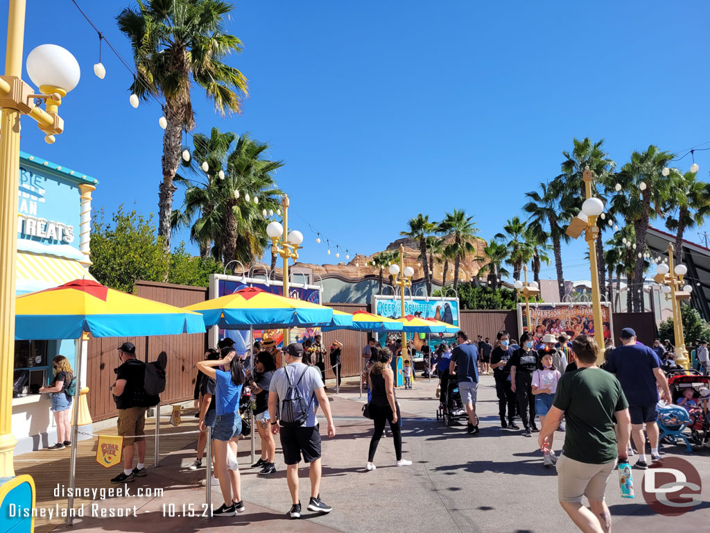 The line for frozen treats stretched to past the Coco billboard.