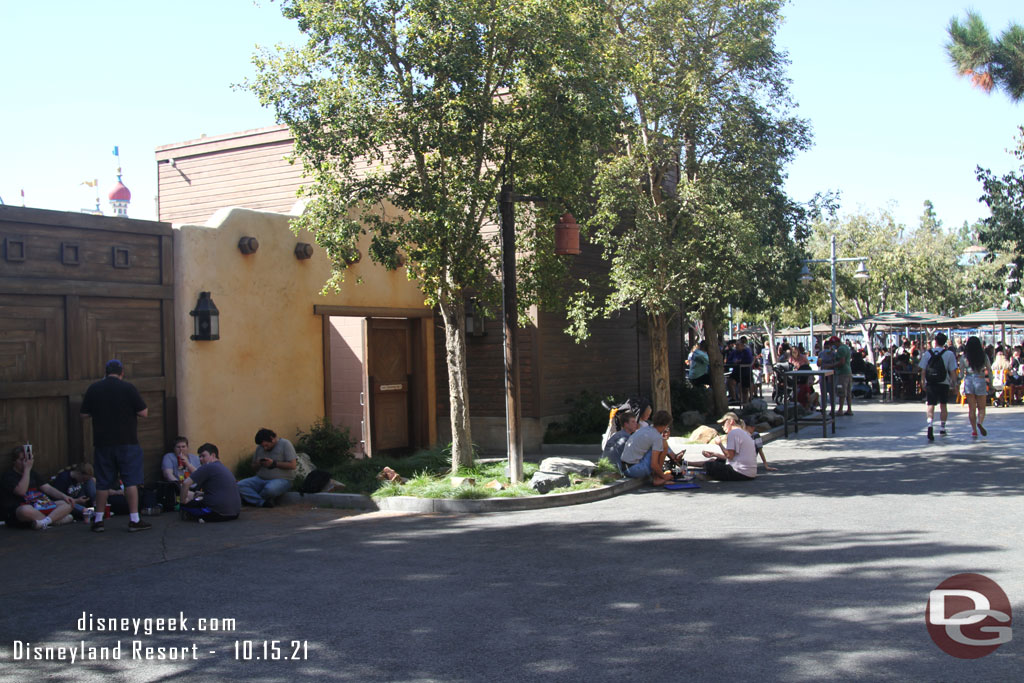 Guests finding curbs and spots in the shade to sit. The wharf was very busy this afternoon.