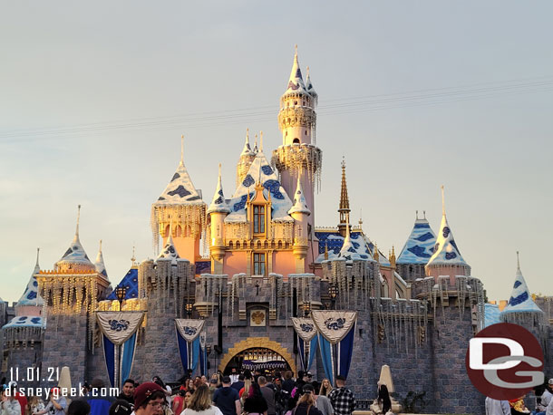 The setting sun illuminating Sleeping Beauty Castle