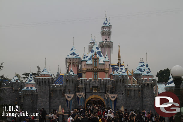 The annual snowfall on Sleeping Beauty Castle. Most of the icicle lights are installed too.