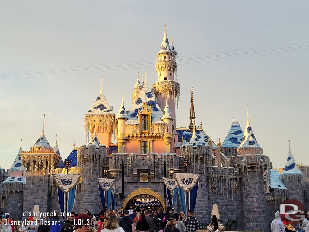 The setting sun illuminating Sleeping Beauty Castle