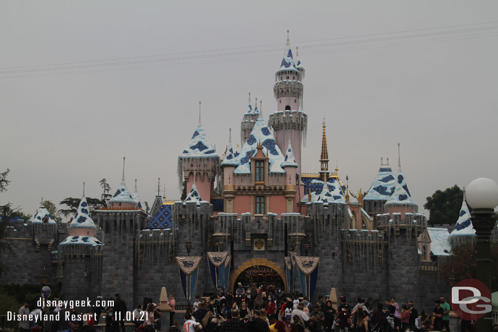 The annual snowfall on Sleeping Beauty Castle. Most of the icicle lights are installed too.