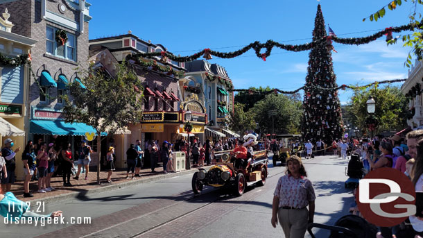 Goofy is onboard the firetruck.