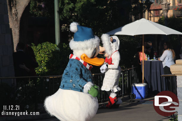 Donald and Clarabell were meeting with media near the castle.