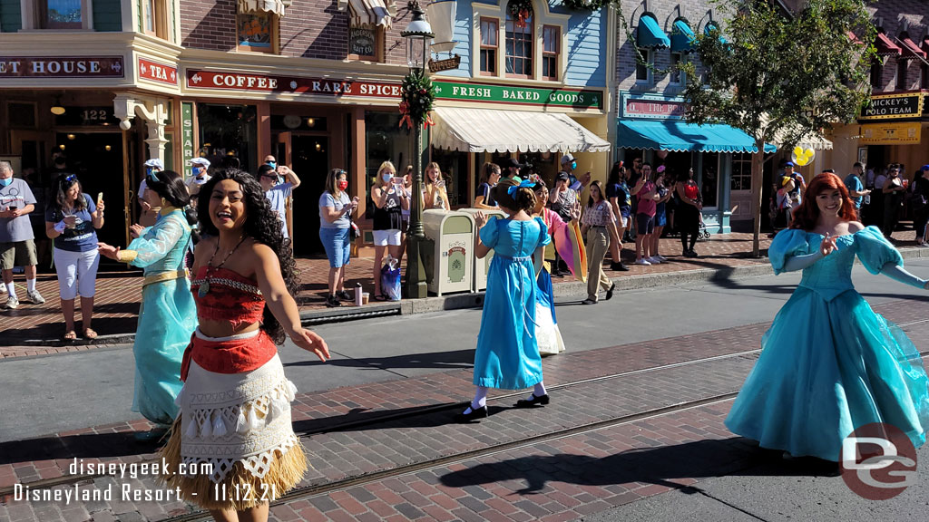 Jasmine and Mulan are also part of the Princess group walking behind the Omnibus.