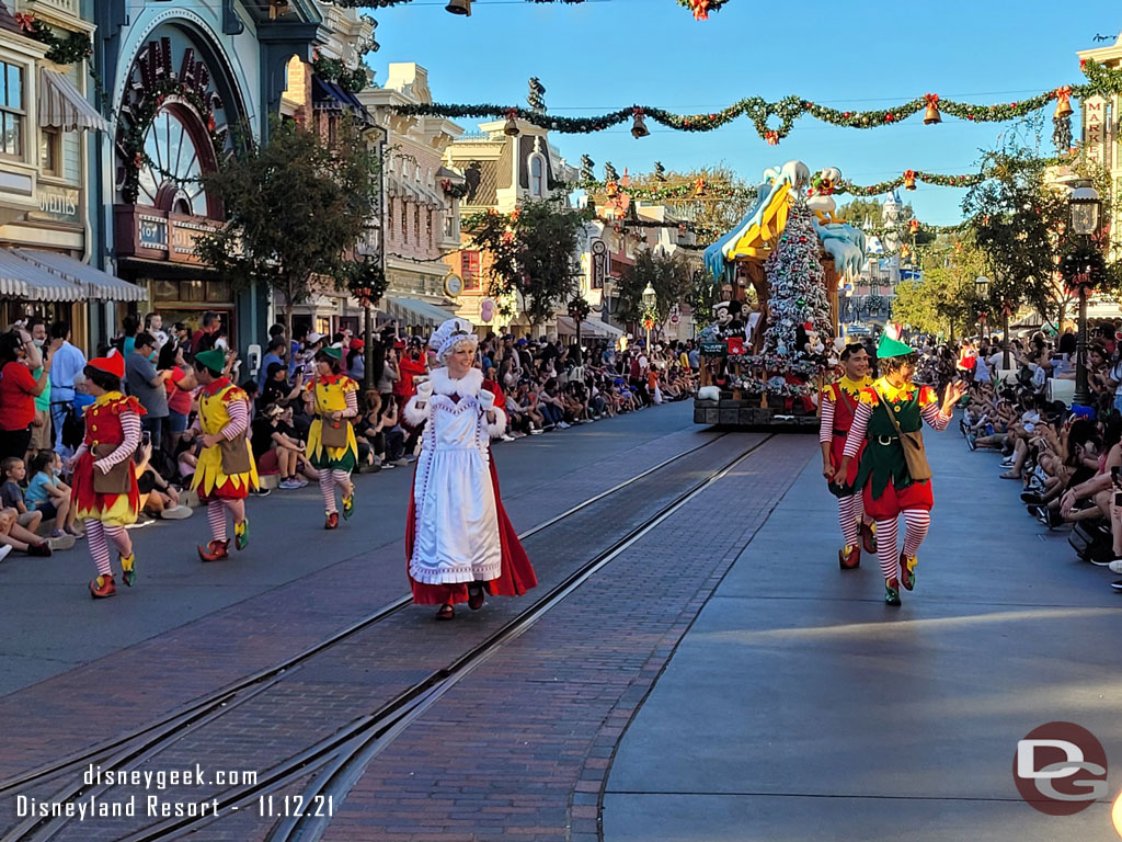 Mrs. Claus with the elves