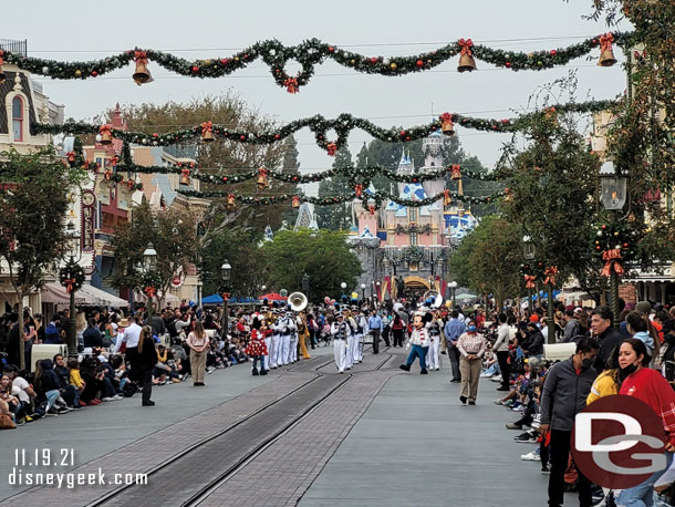 Mickey and Minnie lead the Disneyland Band toward Town Square.