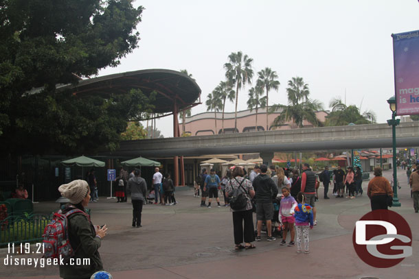 Guests waiting for the monorail to open. It was about 10 minutes prior to park opening.