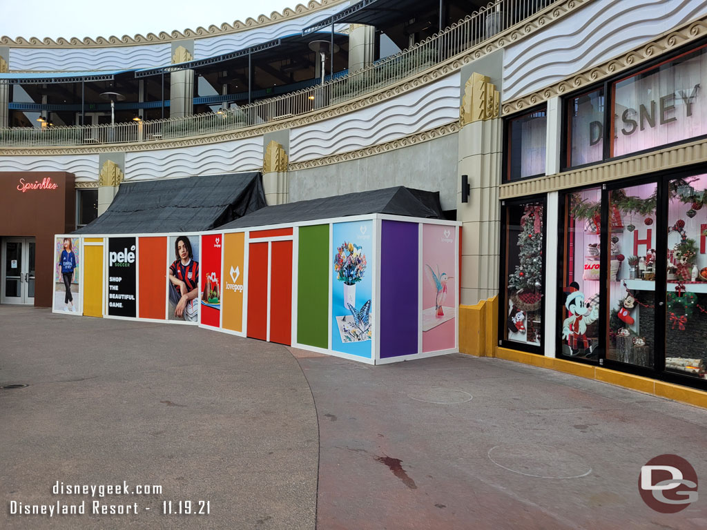 Construction walls for the two newest additions to Downtown Disney.  No indication of opening dates for either.