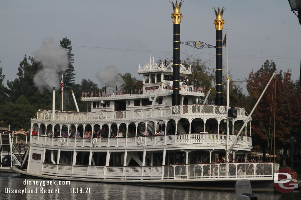 The Mark Twain Riverboat steaming by.  Notice the upper deck is still closed.