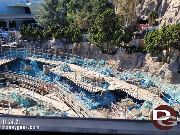 The renovation work for the Finding Nemo Submarine Voyage continues. There were crews working in the lagoon this morning.