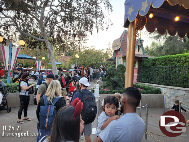 Casey Jr had a 10 min wait posted.. so we hopped in line.  Two trains were running but we started back near the Dumbo queue.  Turned out to be about 12 minutes from this picture until we were in a cage and ready to roll.