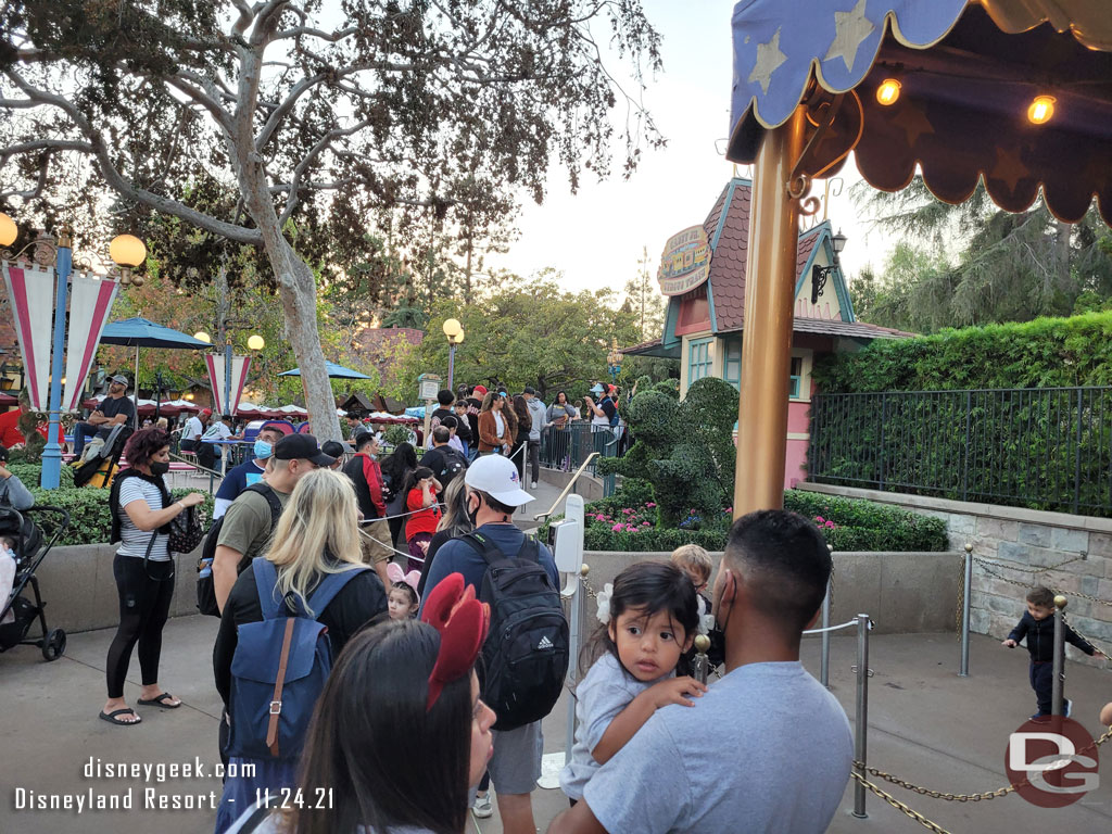 Casey Jr had a 10 min wait posted.. so we hopped in line.  Two trains were running but we started back near the Dumbo queue.  Turned out to be about 12 minutes from this picture until we were in a cage and ready to roll.