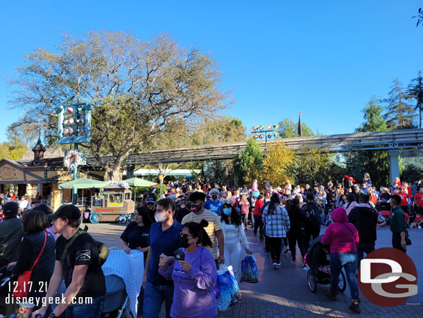 I was held up by Cast Members at the parade crossing.  They have tweaked the traffic flow slightly.  to my right are guests crossing toward the Matterhorn.  To my left are guests making their way to Fantasyland.  Once the parade crossing finishes they the