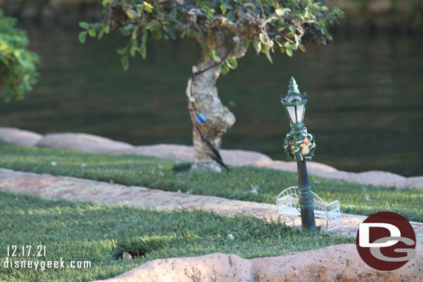 The park has wreaths on the lamp posts