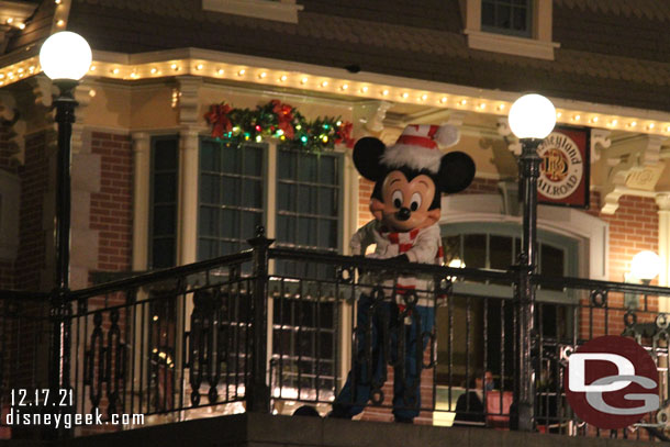 Mickey Mouse greeting guests in Town Square.