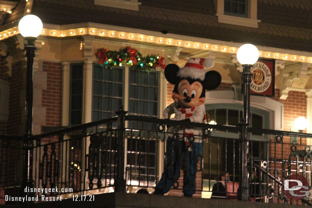 Mickey Mouse greeting guests in Town Square.