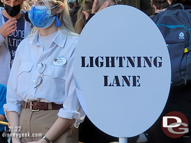 A sign for Indiana Jones Lightning Lane returns