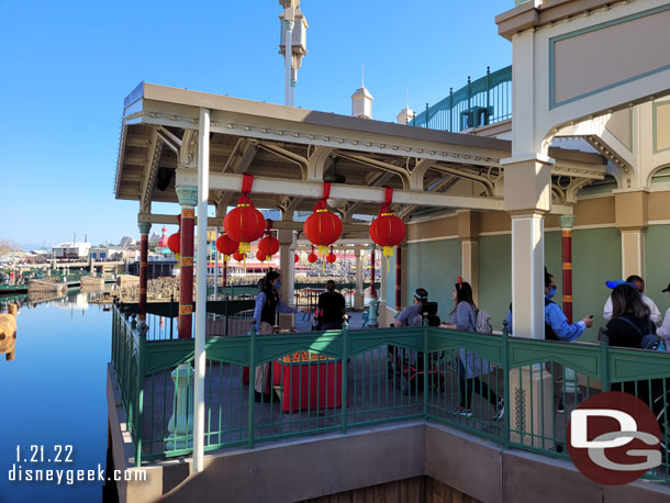 Magic Key Passholders can stop by the area under the Silly Symphony Swings to pick up a button and take a photo.