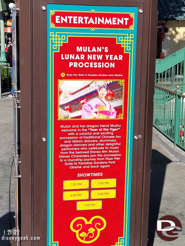 A sign with show times for the procession. Notice there are a couple after dark.