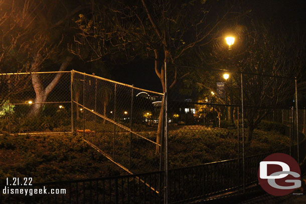 Walking back to the parking structure. The scrim on the construction fences around the tram stop had been removed, assuming because of wind.