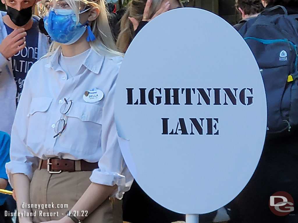 A sign for Indiana Jones Lightning Lane returns