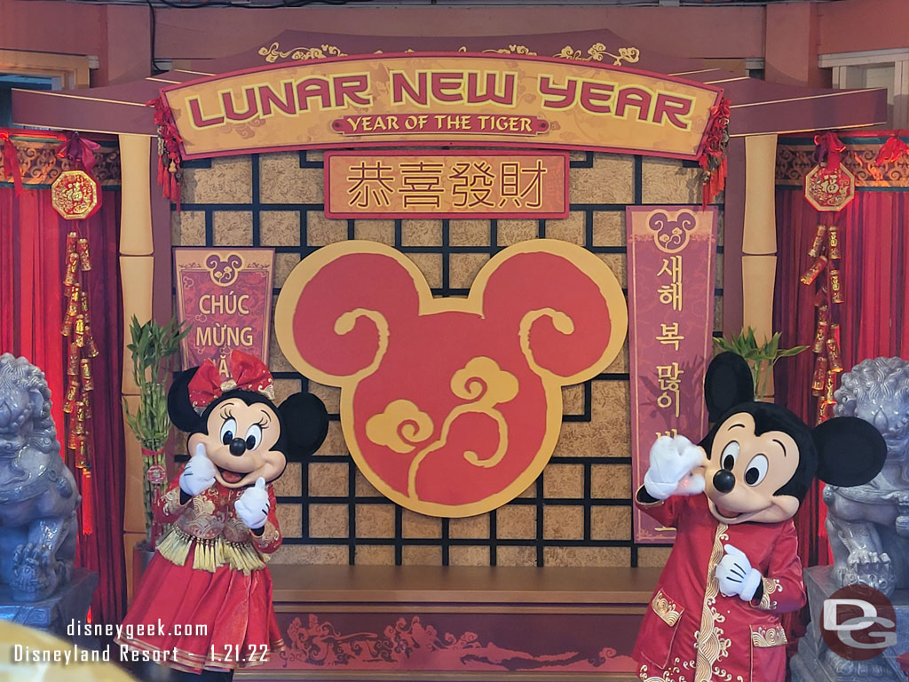 Mickey Mouse and Minnie Mouse in their Lunar New Year outfits. They are not part of the Procession this year.