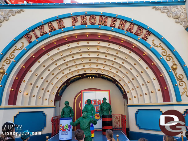 Green Army Patrol performing on the stage in Pixar Pier.