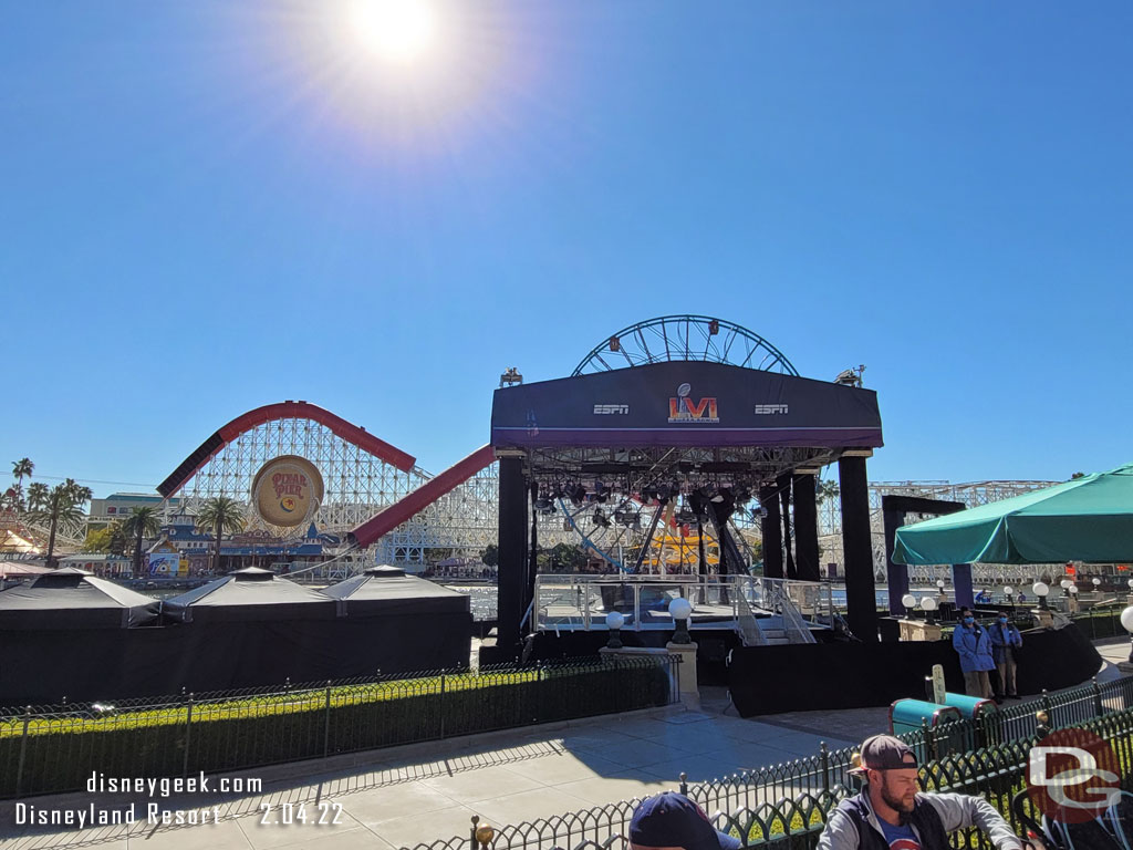 The stage is in the fountain area in the middle, not down by the water.  Lines up so Mickey is directly behind them it appears.