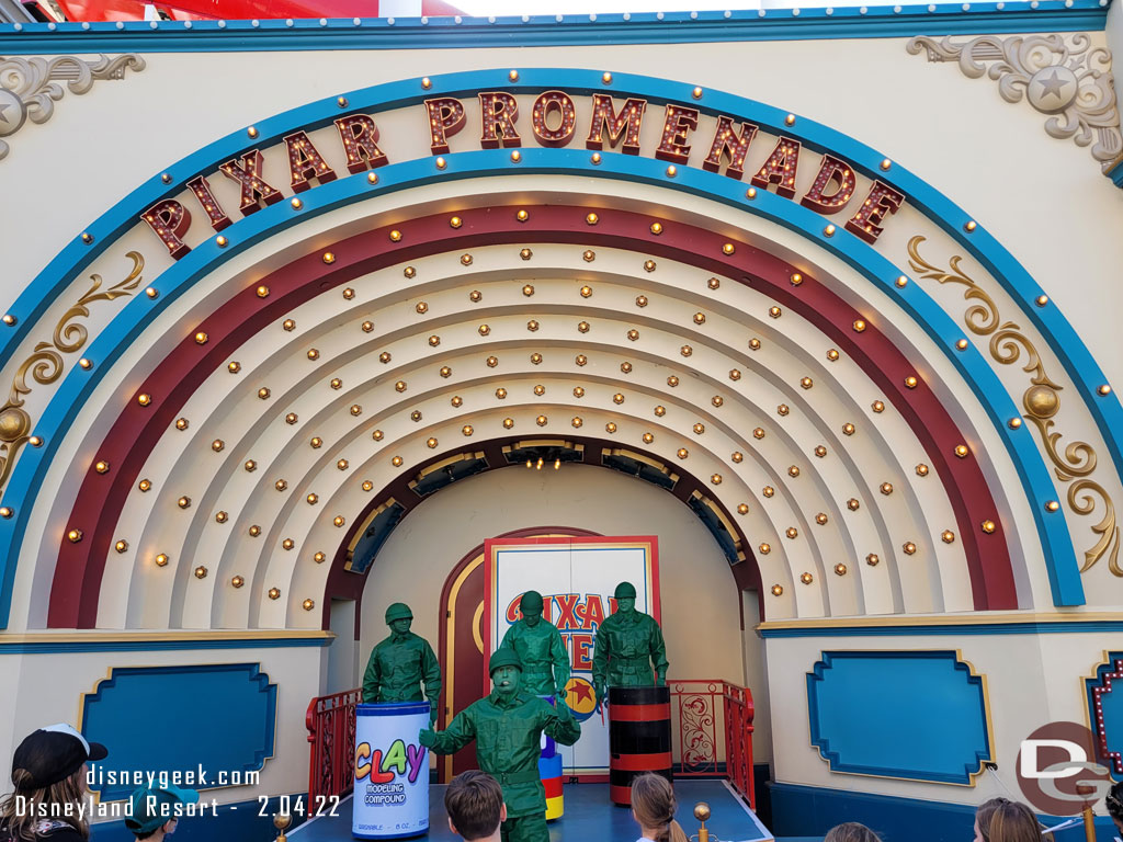 Green Army Patrol performing on the stage in Pixar Pier.