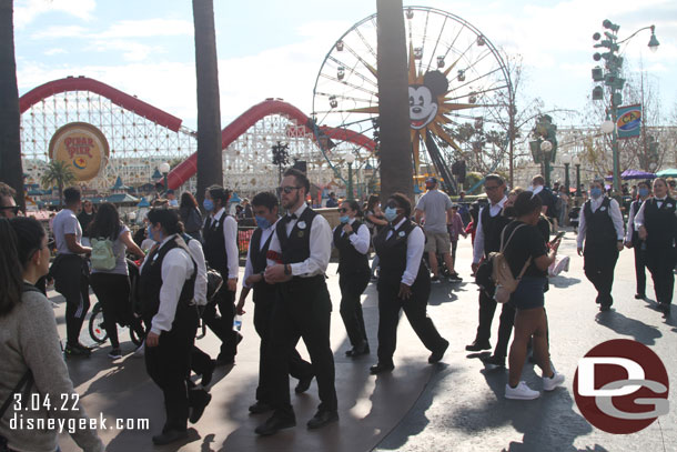 A large group of servers walked by.