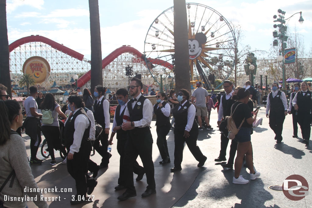 A large group of servers walked by.