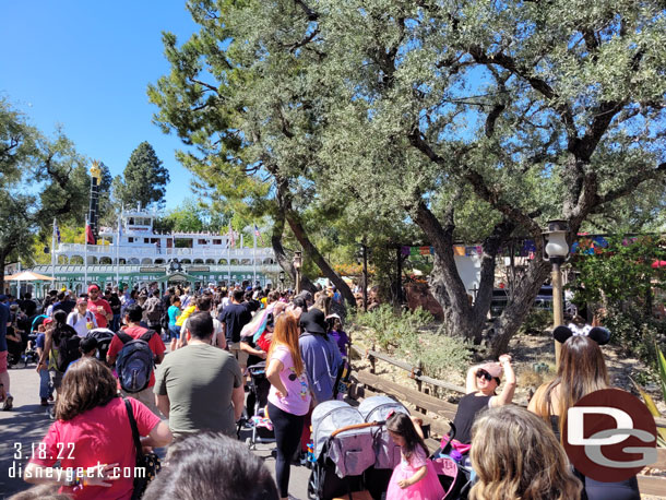 On the right is a line for the character meet and greet location.  The location features Miguel from Coco and Mirabel from Encanto rotating throughout the day.