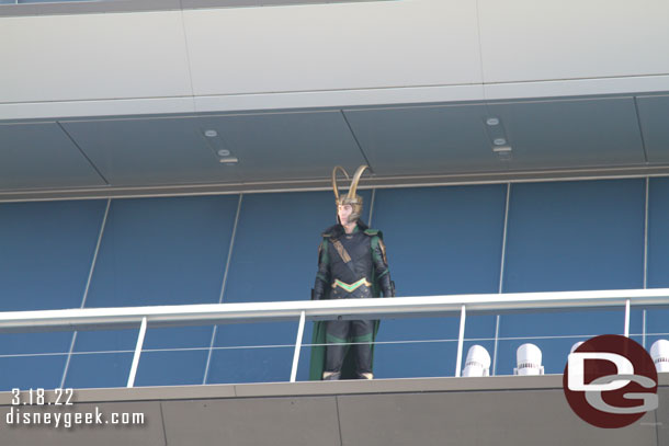 Loki looking over Avengers Campus