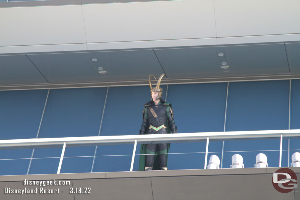 Loki looking over Avengers Campus