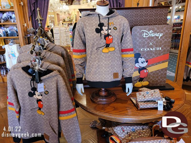 Disney x Coach merchandise featured in a couple displays.