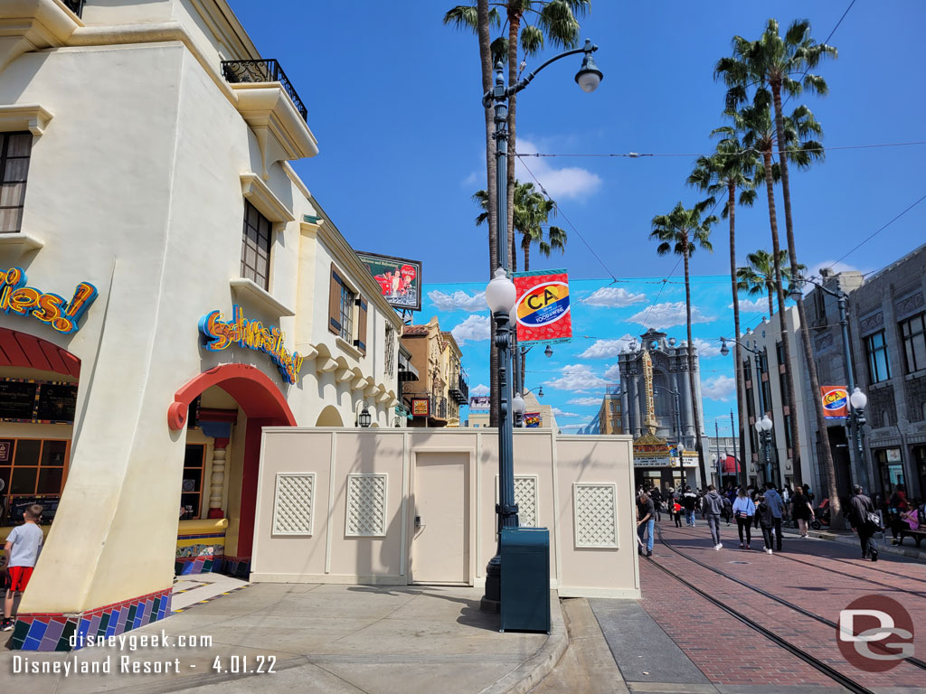 Work on the sidewalks continues. Walls are up around where the market is.