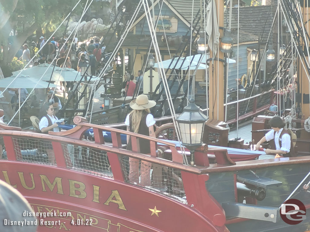 The Columbia had just finished its day and the crew was folding the flag as we cruised by.