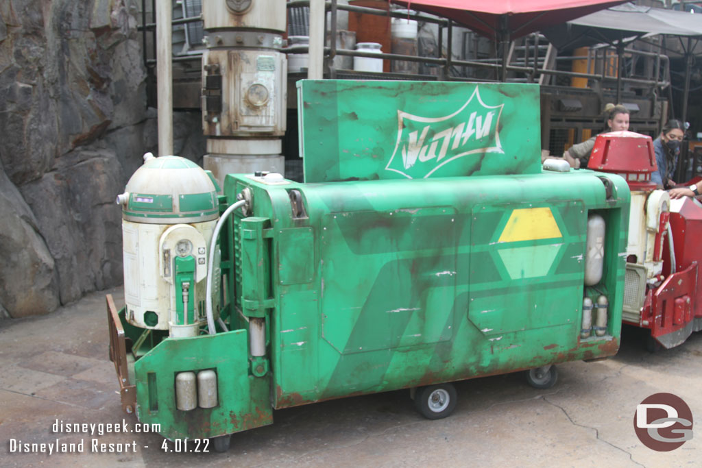 The Sprite cart restocking the stand.