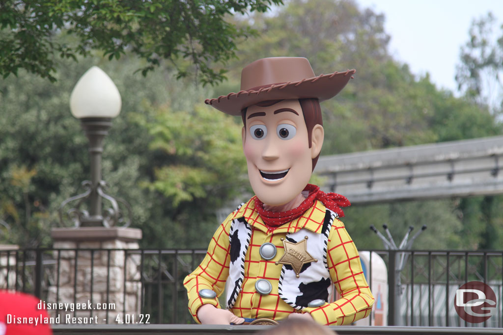 Woody greeting guests in the small world mall area.